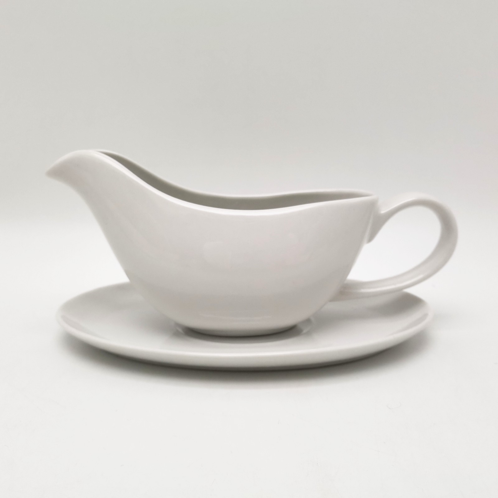 ceramic gravy boat and saucer.jpg